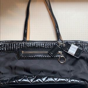 Coach black bag with paten leather details